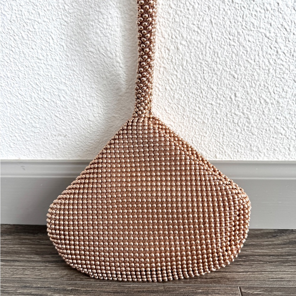 INC rose gold evening bag